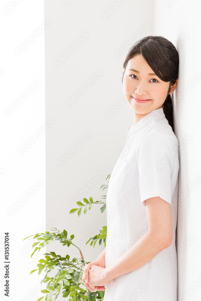 young asian nurse isolated on white background