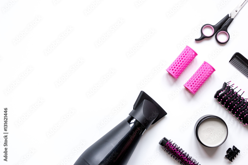 preparations for styling hair on white background top view