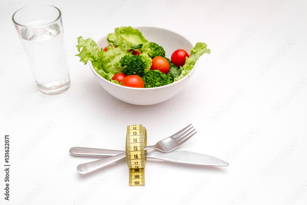 concept diet fresh vegetables on plate at white background