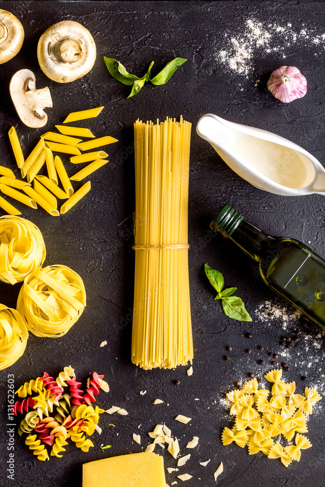 ingredients for cooking paste on dark background top view