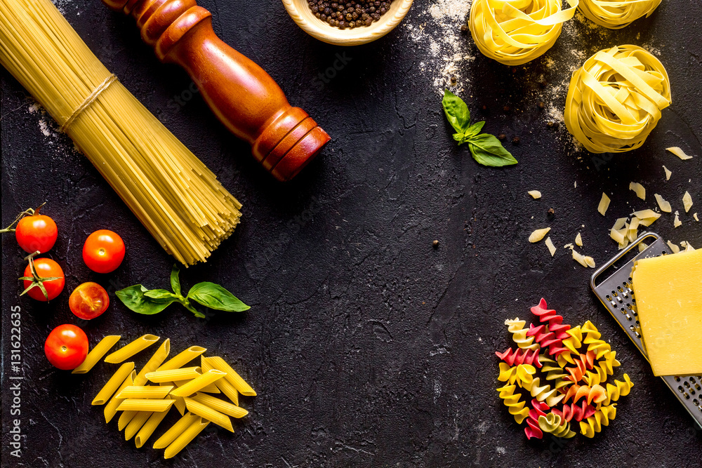 ingredients for cooking paste on dark background top view