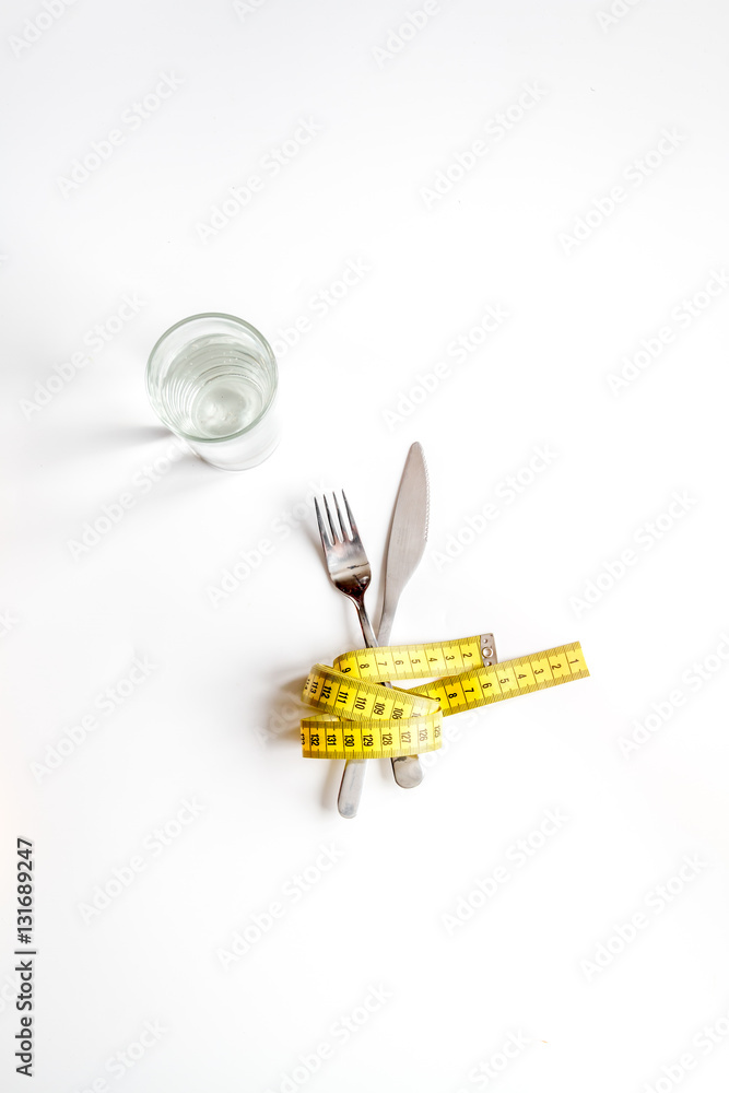 concept slimming diet fresh vegetables on white background top view