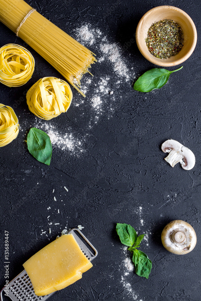 ingredients for cooking paste on dark background top view