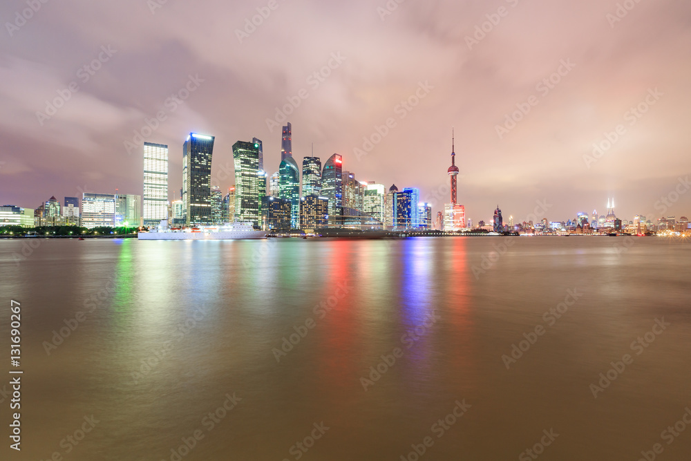 Shanghai skyline and modern cityscape at night,China