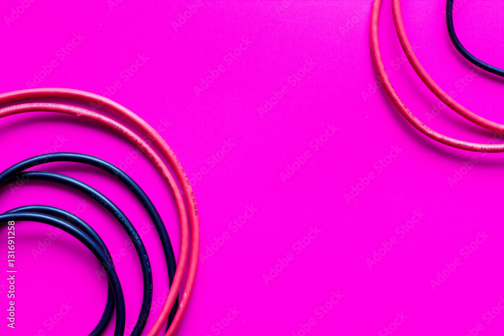 concept network internet cable on pink background close up