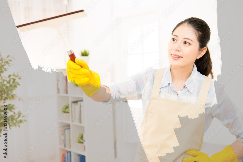 woman in gloves cleaning window