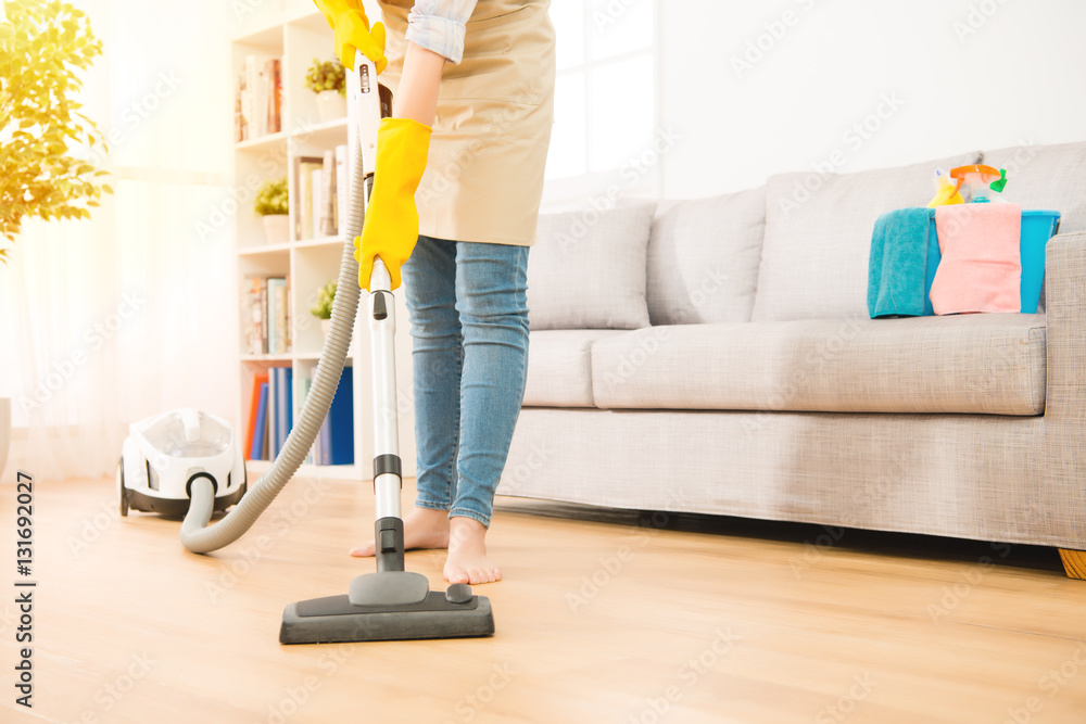 Woman use vacuum cleaner to cleaning