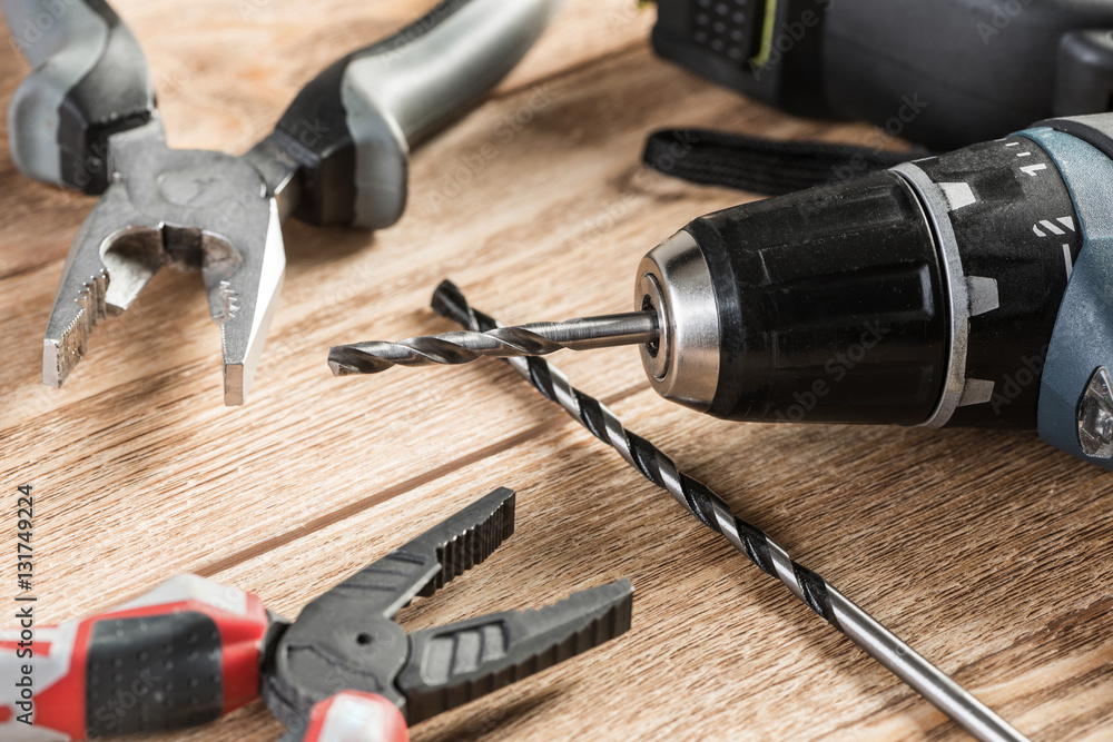 Carpentry tools on wooden surface