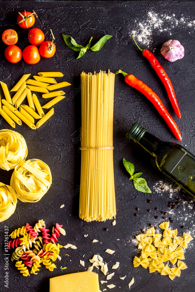 ingredients for cooking paste on dark background top view