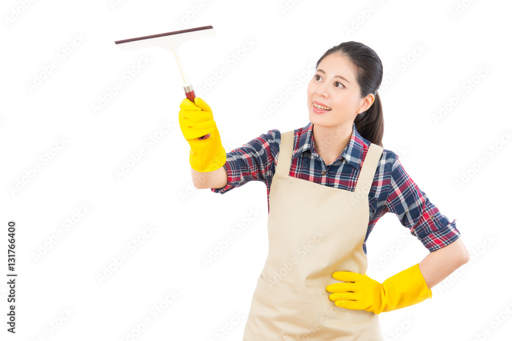 woman cleaning window with glass wiper