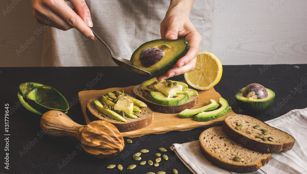 making sandwiches with avocado healthy organic food