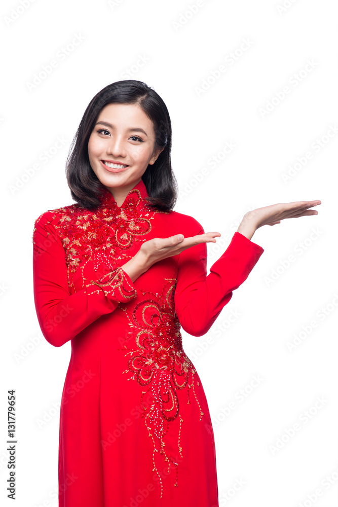 Smile Vietnamese woman in dress traditional Ao Dai and introduce