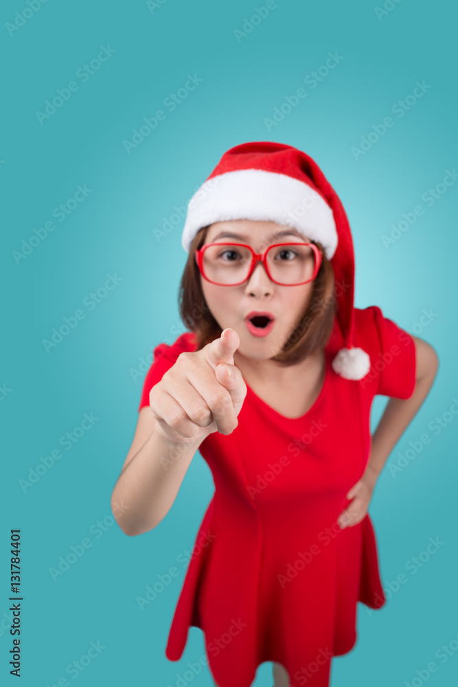 Smiling asian woman portrait with christmas santa hat isolated o