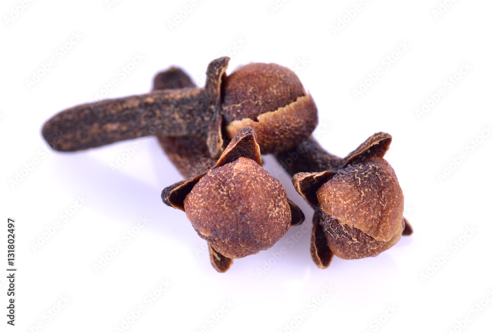 dry cloves on white background