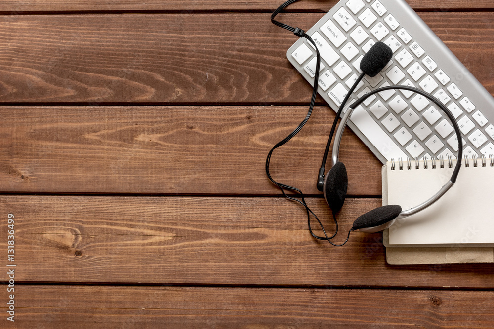 call center manager desktop top view wooden background