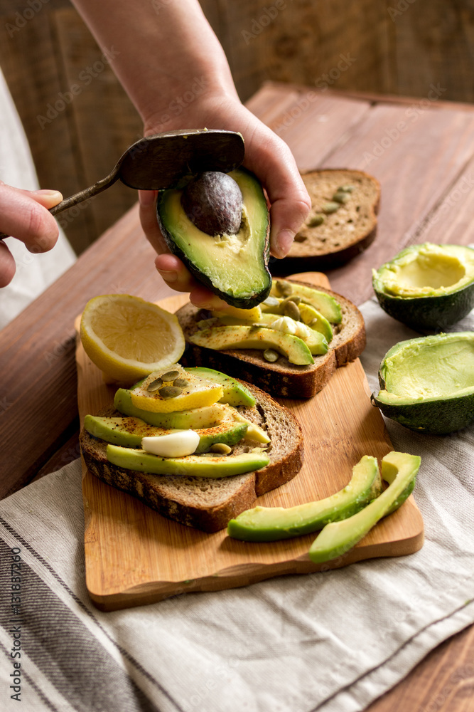 making sandwiches with avocado healthy organic food