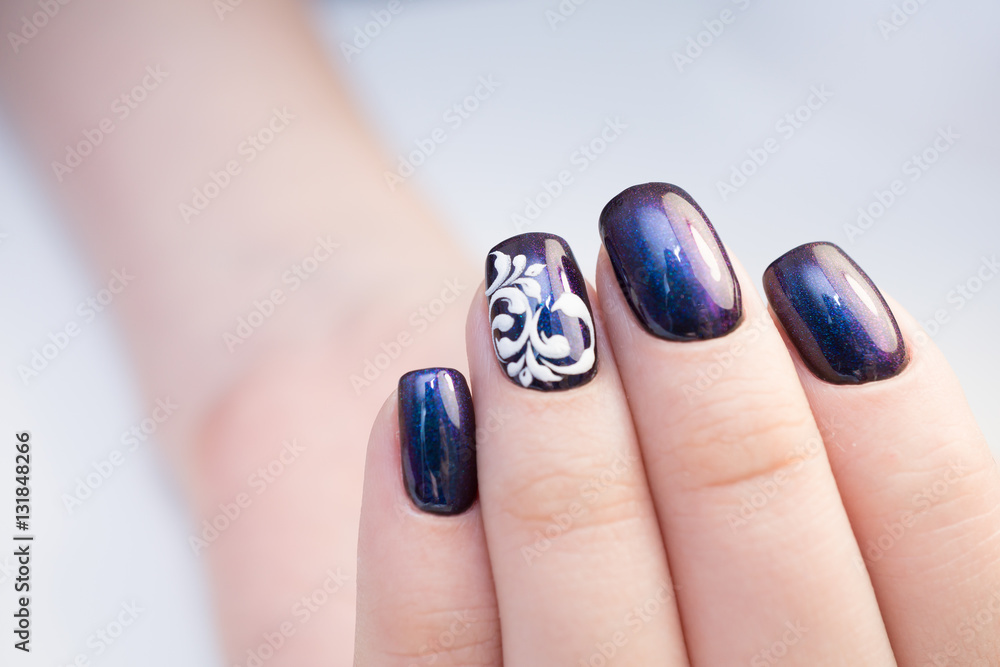 Perfect manicure and natural nails. Attractive modern nail art design. Gel polish applied.