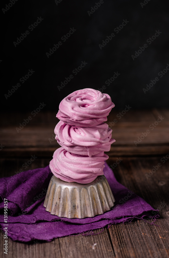 Russian marshmallows, zephyr on wooden table. Still life.