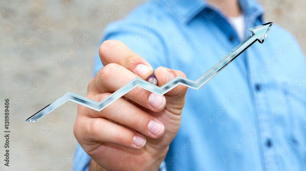 Businessman drawing digital blue arrow with a pen 3D rendering