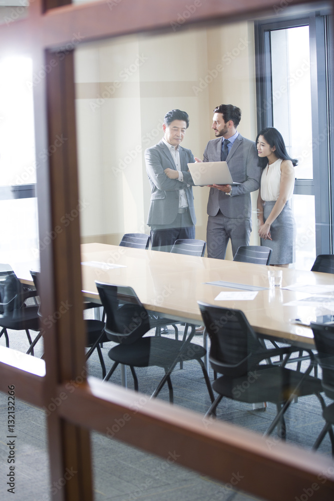 Business people talking in meeting room