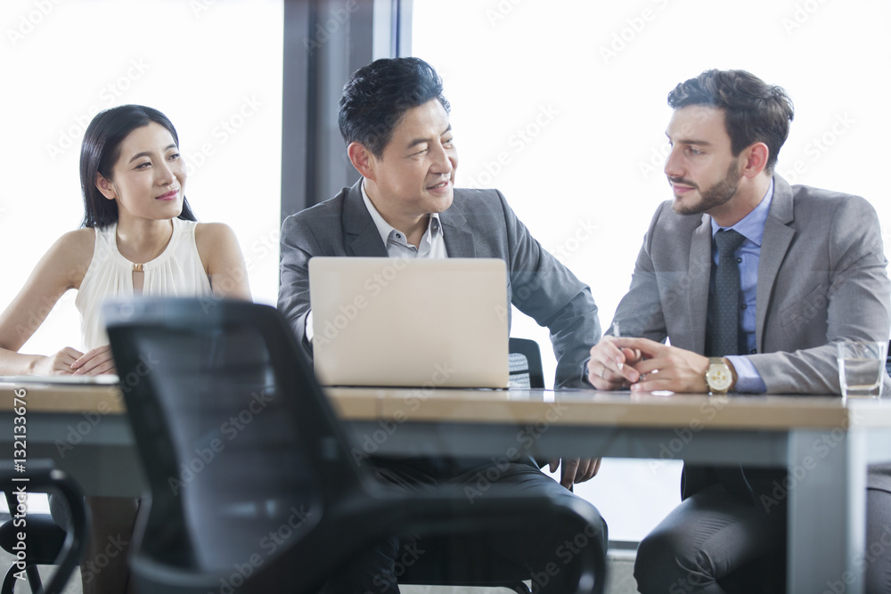 Business people talking in meeting room