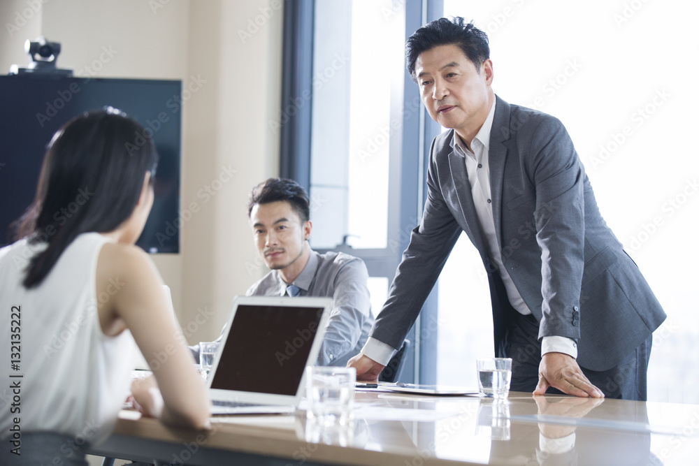 Business people talking in meeting room