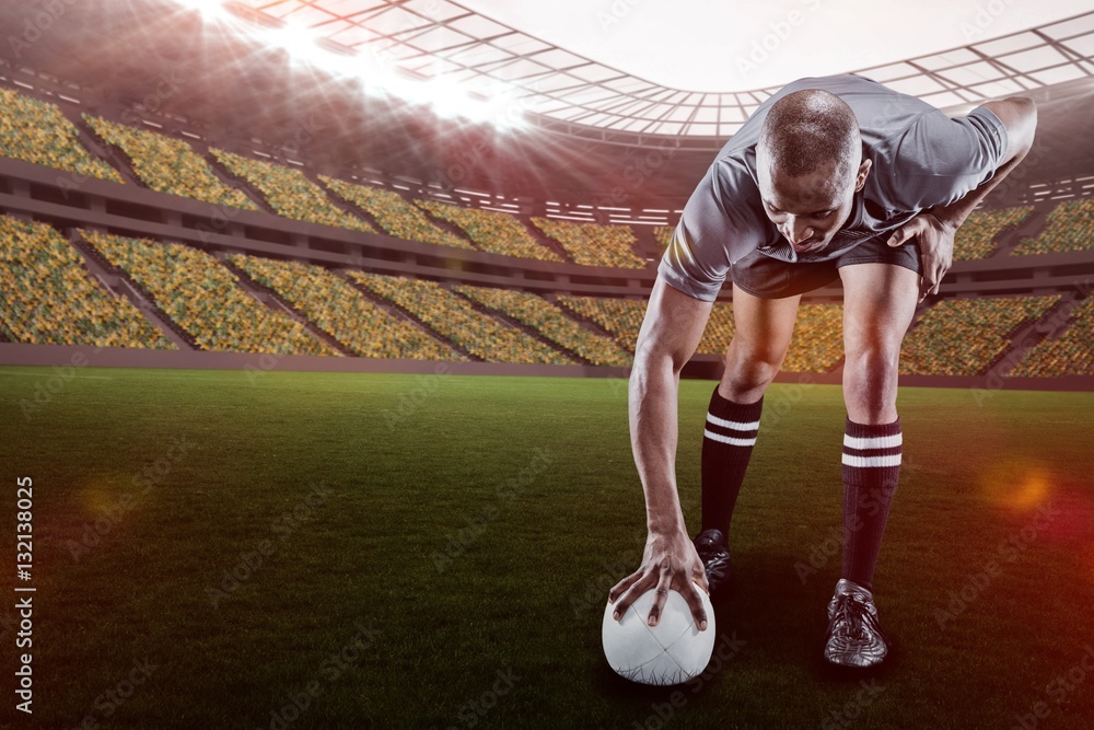 Composite image of rugby player taking position with 3d 