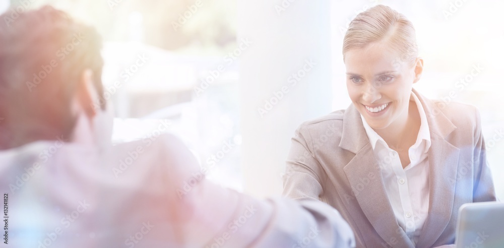 Manager interviewing a male applicant