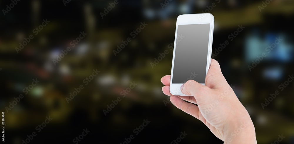 Composite image of woman showing smartphone 3d