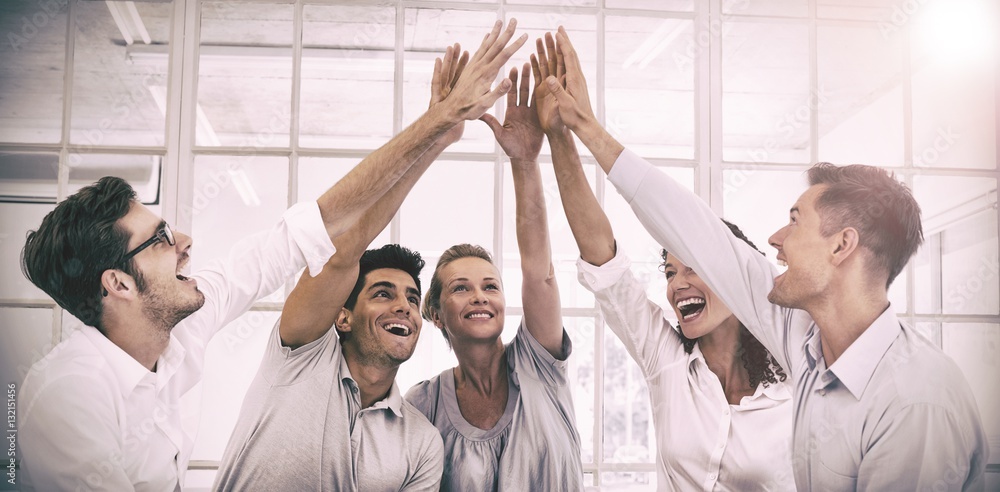 Group therapy in session sitting in a circle high fiving