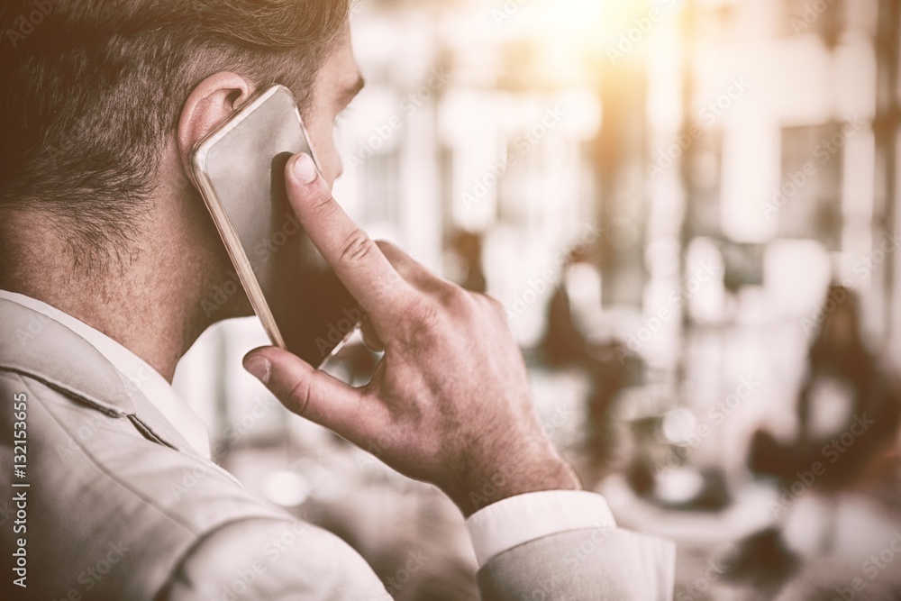 Businessman talking on mobile phone