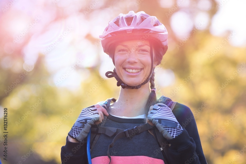 Portrait of female biker smiling