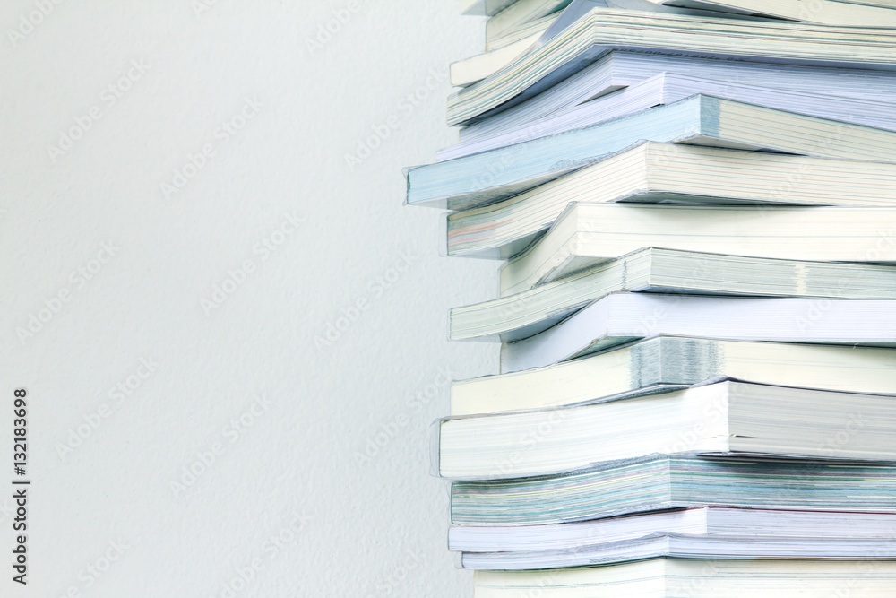 Close up book stacked  with concrete wall background