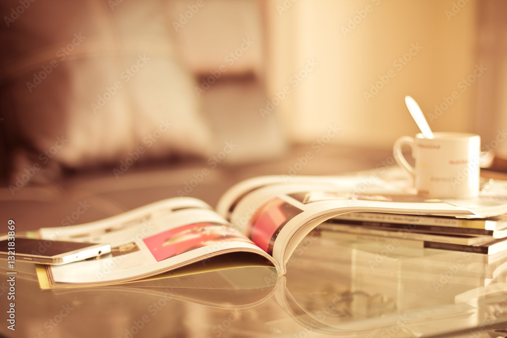 selective focus of stacking magazine place on table in living ro