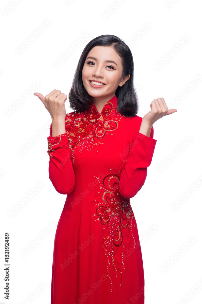 Smile Vietnamese woman in dress traditional Ao Dai and introduce