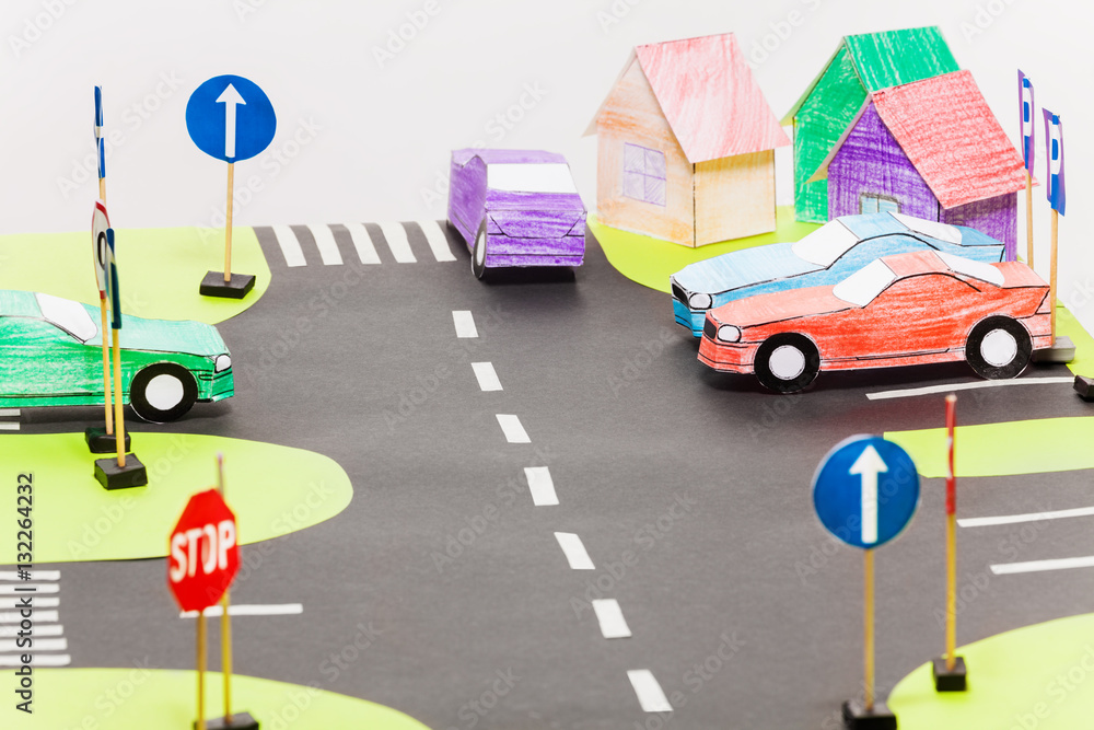 Playing set with road sings, crossings and cars