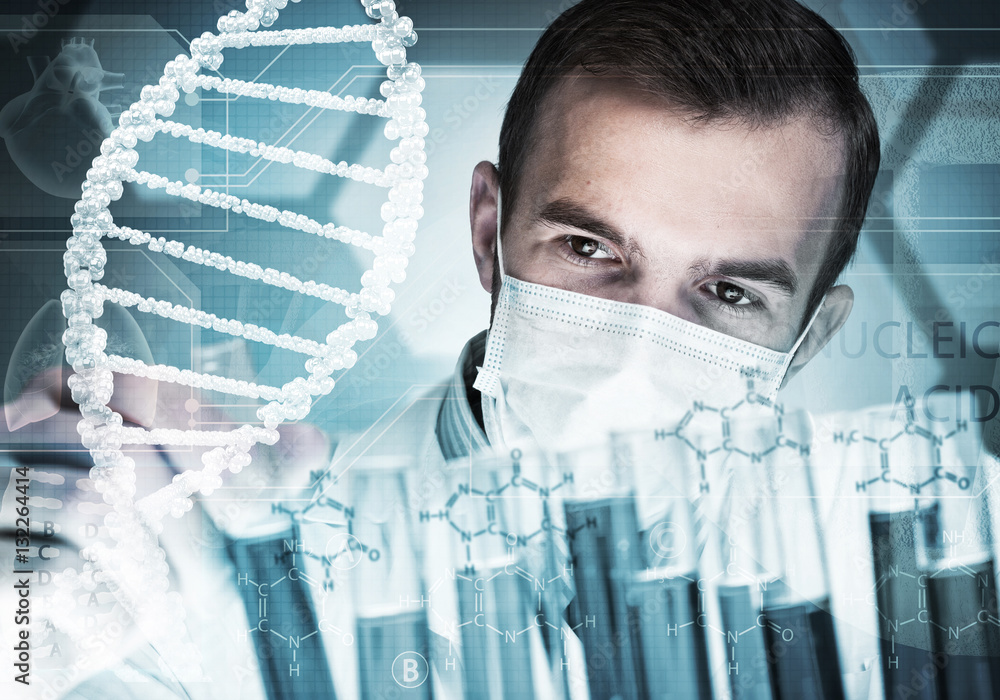 Portrait of concentrated male scientist working with reagents in laboratory