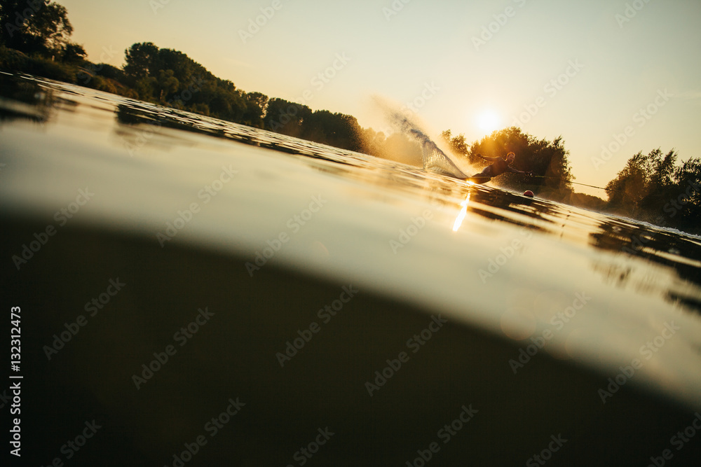 Man riding wakeboard on a lake