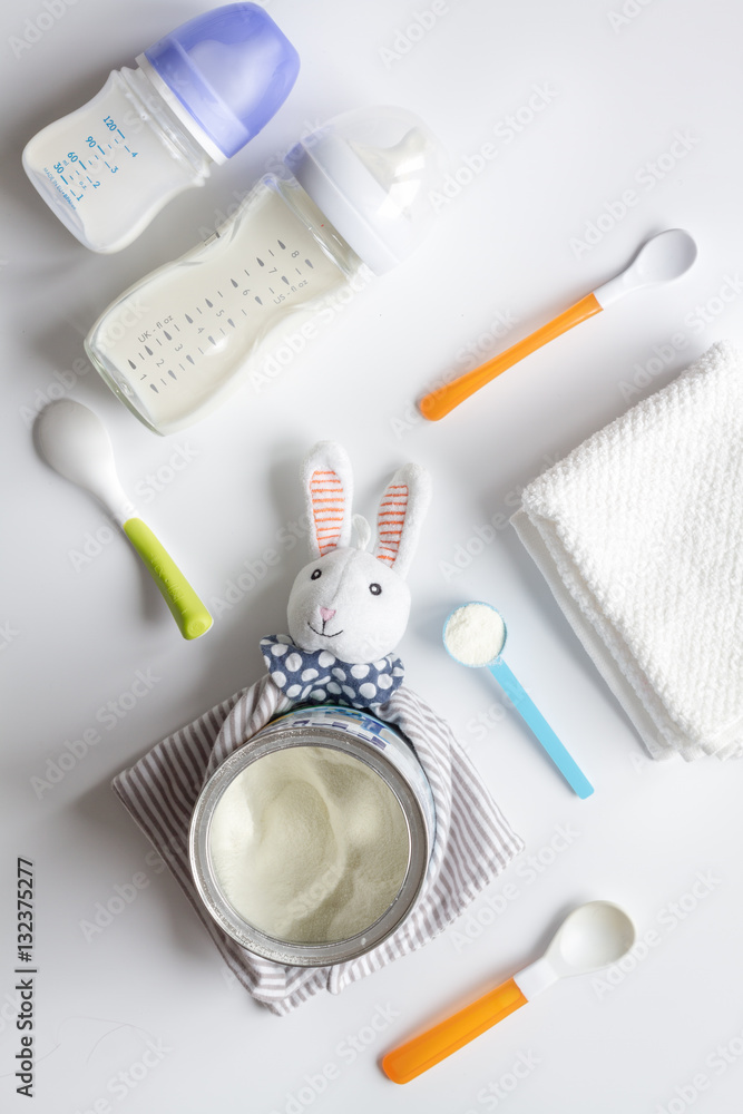 preparation of mixture baby feeding on white background top view