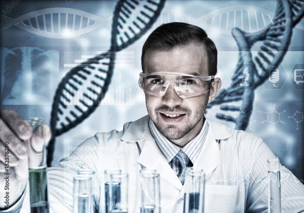 Young scientist mixing reagents in glass flask in clinical laboratory