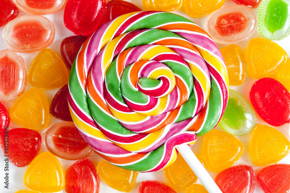 sweets and sugar candies on white background top view