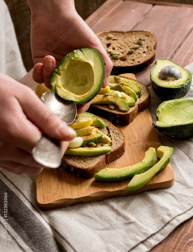 making sandwiches with avocado healthy organic food