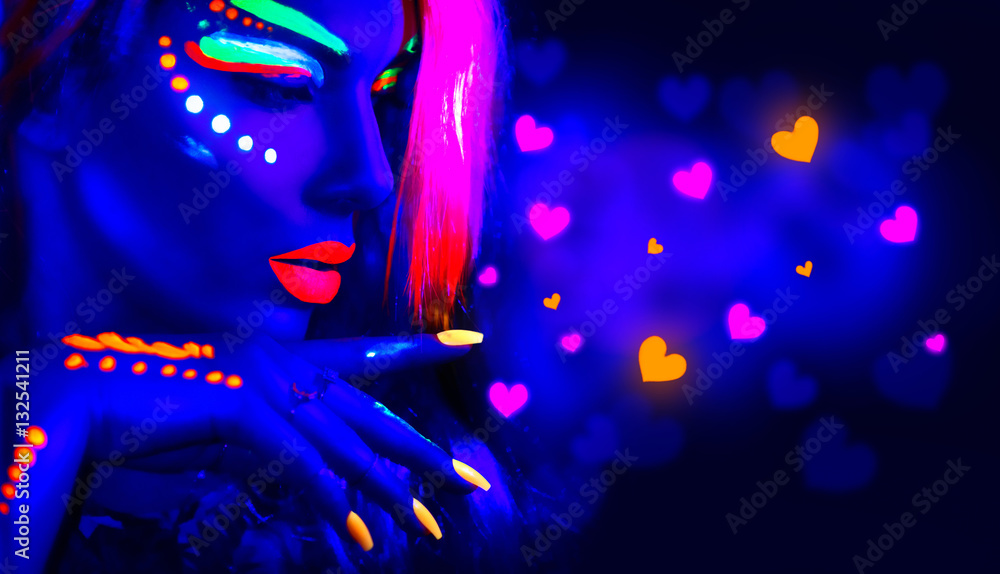 Valentines day disco party. Fashion model girl in neon light, flying Valentine neon hearts