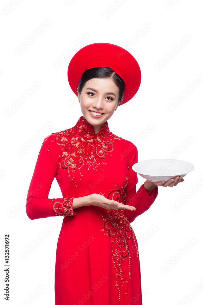 Smile Vietnamese woman in dress traditional Ao Dai and introduce