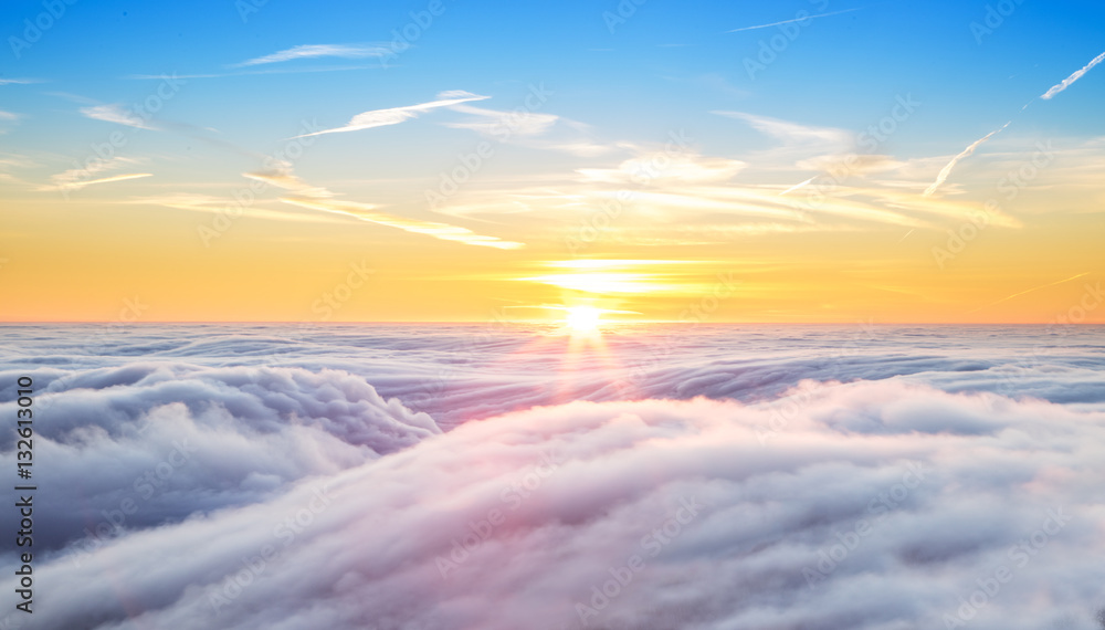 Beautiful sunset above clouds