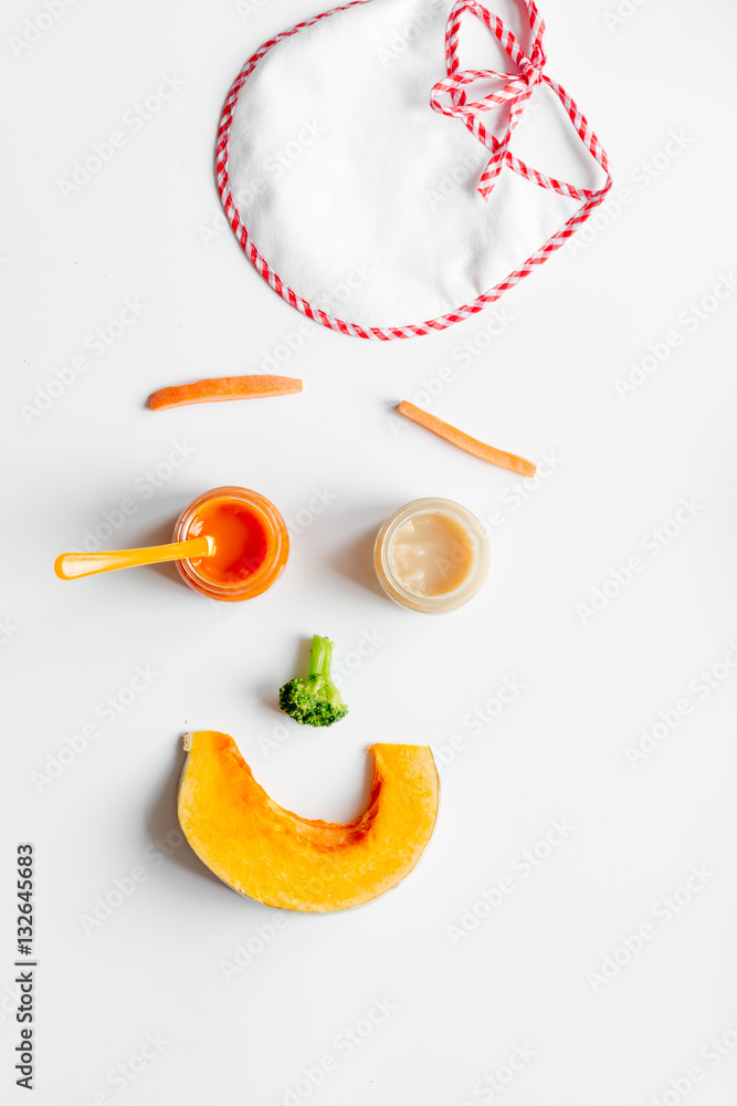 cooking vegetable puree for baby on white background top view