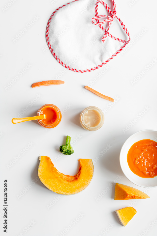 cooking vegetable puree for baby on white background top view