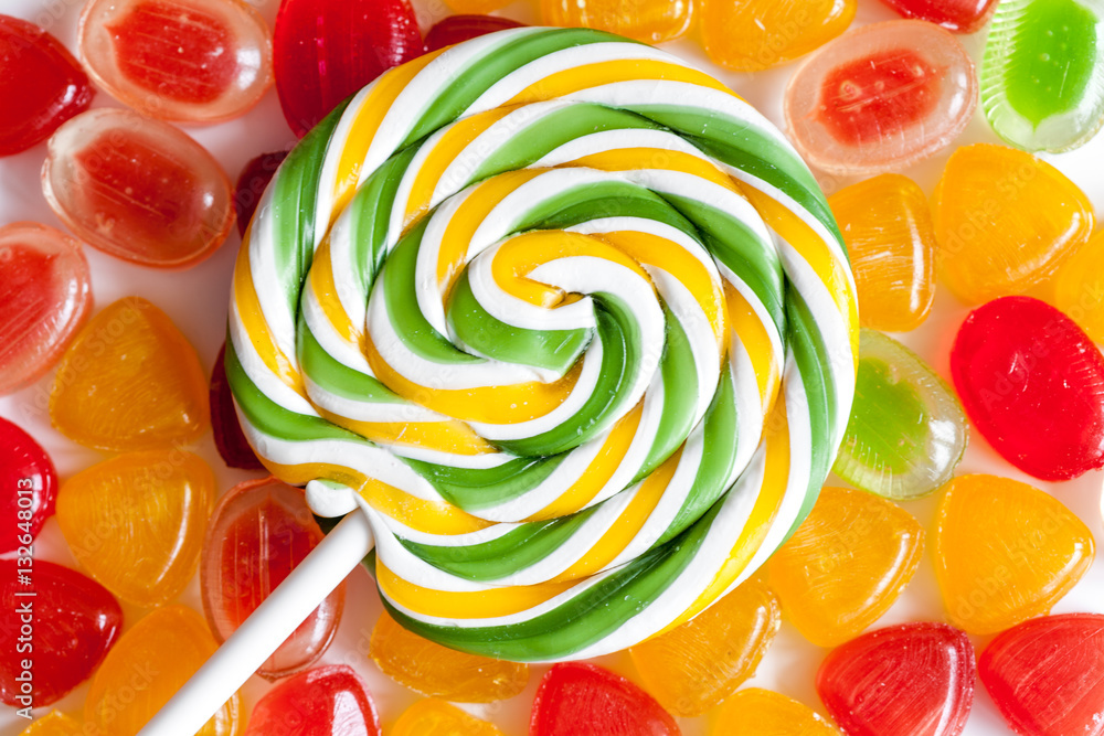 sweets and sugar candies on white background top view