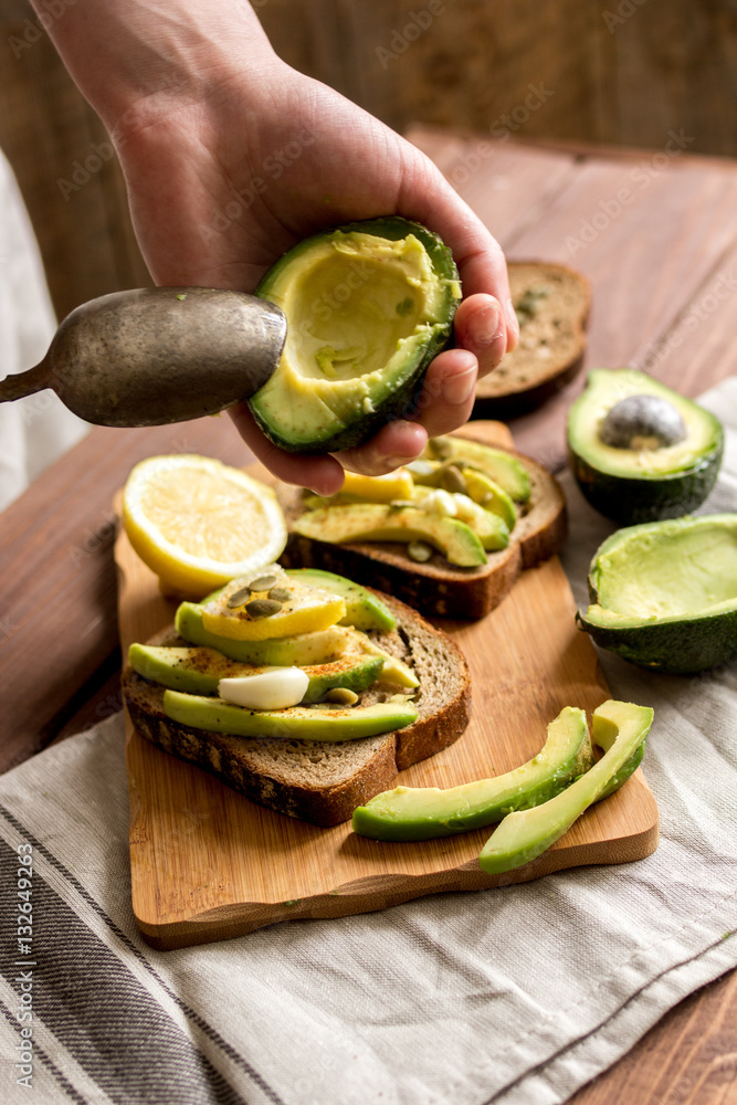 making sandwiches with avocado healthy organic food