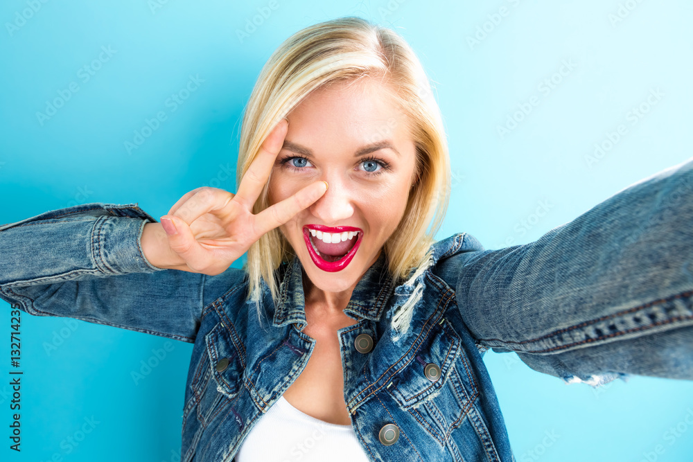 Young woman taking a selfie